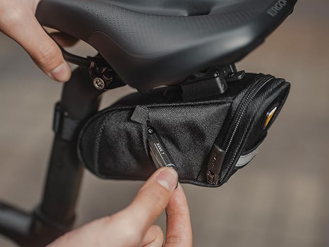 Topeak Aero Wedge Pack DX Small – 0.5 L Expanding Under‑Saddle Bag with QuickClick F25 Mount, Reflective Strip & Side Tool Pockets