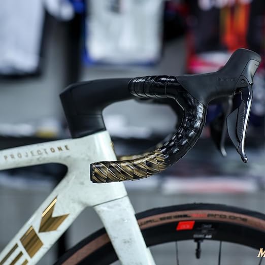 GUEE SL Speed Road Bike Handlebar Tape – Premium PU Leather, Microtex Structure, Shock-Absorbing Foam, Ultra-Light 30g, Anti-Slip Racing Grip (2 Rolls, Wild Gold)