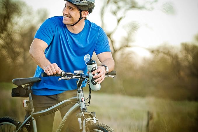 Schwinn Sport Water Bottle with Holder for Bicycle, 23 oz, BPA-Free, No-Slip Grip, Dust Cap Lid, Cage Easily Mounts to Bike, Bike Water Bottle Holder Combo